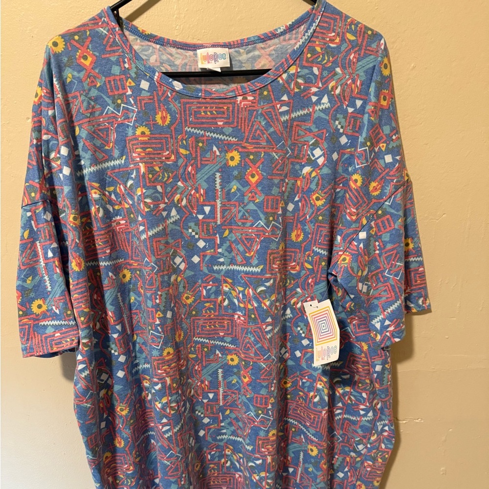LuLaRoe Irma Tunic Top
Geometric Abstract Blue Orange
Yellow NWT